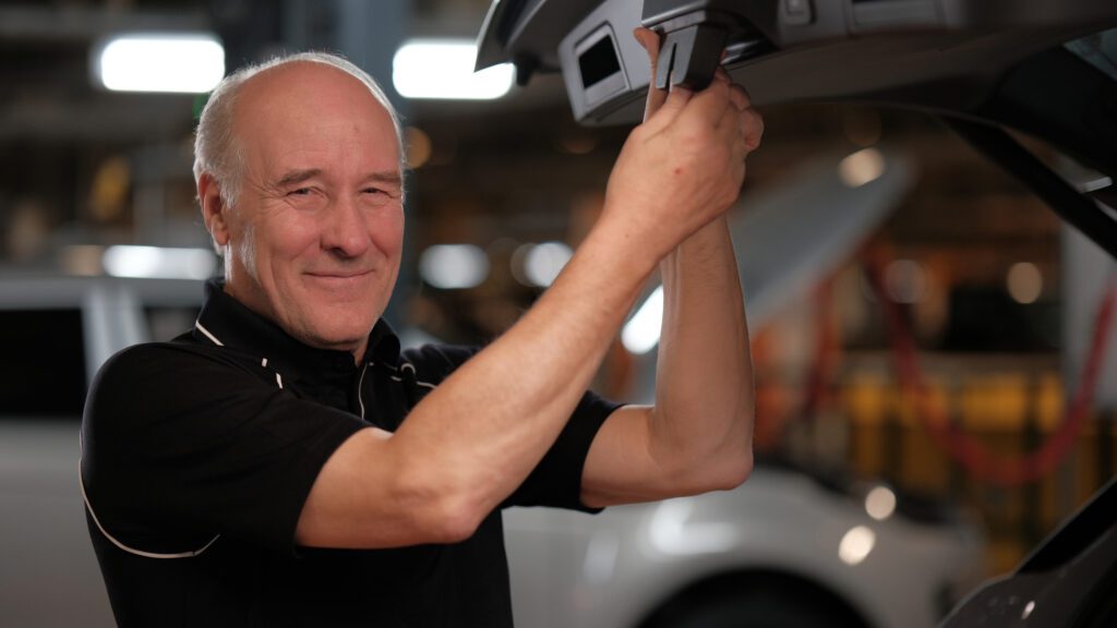 JLR - Technician Working Under The Bonnet