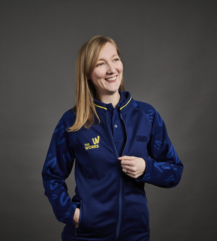 The Works - Female Colleague In Navy Zip Jacket